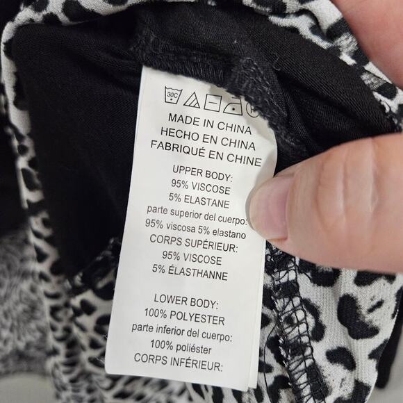 Michael Kors soft black and cheetah print 3/4 Length sleeves top. Size small. - Picture 6 of 7